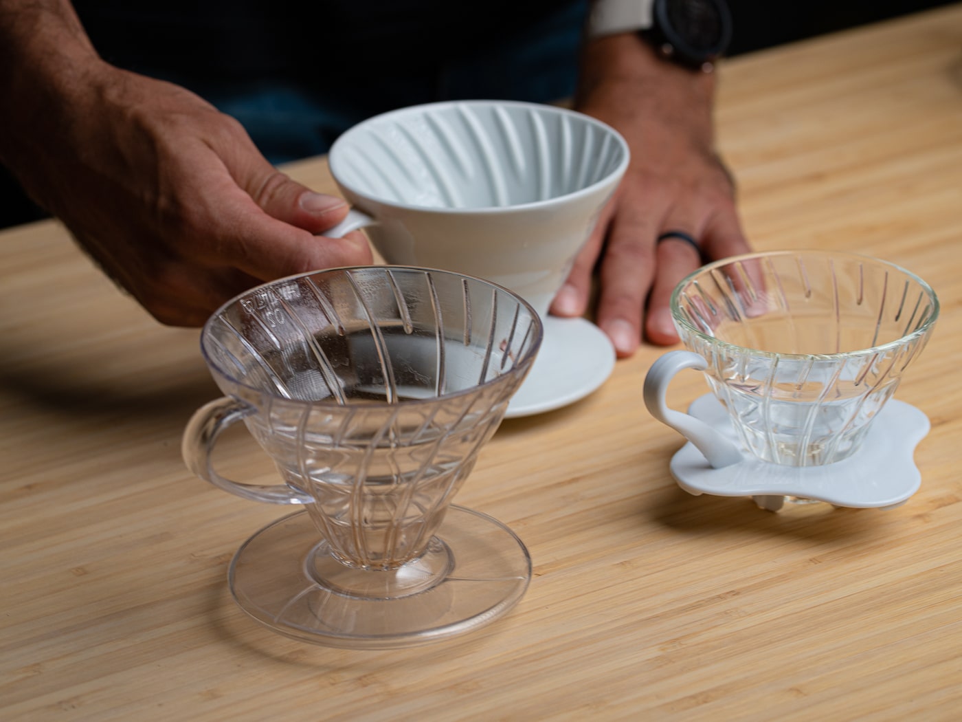 Plastic, ceramic, and glass V60s side by side