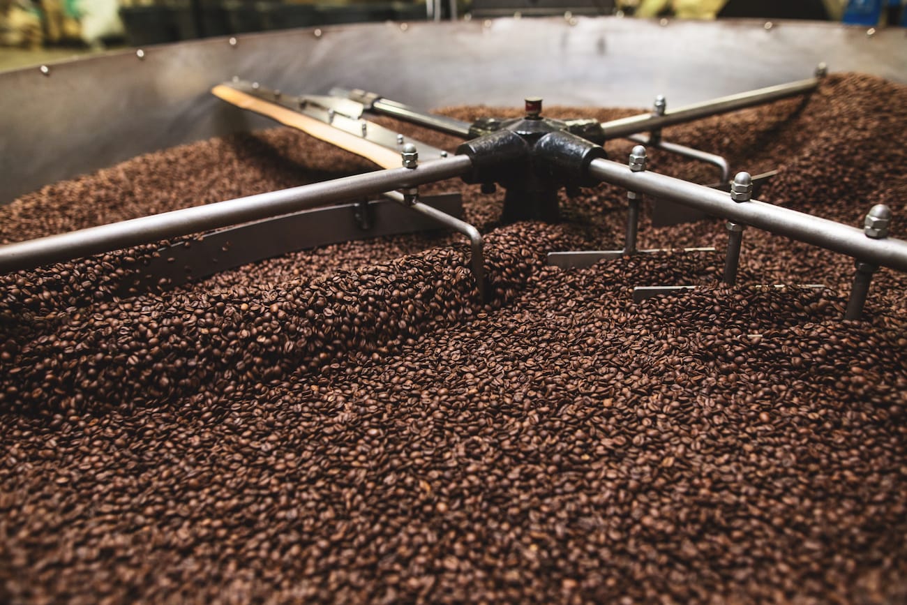 Roasted coffee in a cooling tray