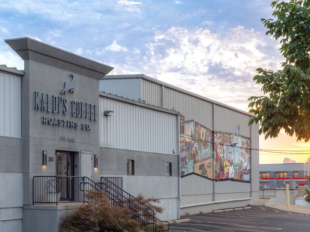 Kaldi's Roastery lit by the morning sun.