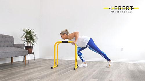 Knee tucks to L-sits on Equalizer bars: A full-body exercise that