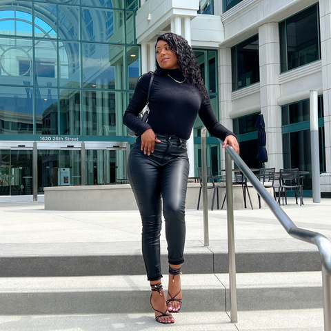 black faux leather pants, black mock neck bodysuit 