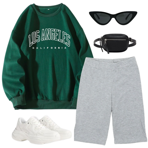 olive green graphic sweatshirt, grey biker shorts, black cat eye sunglasses, black leather fanny pack