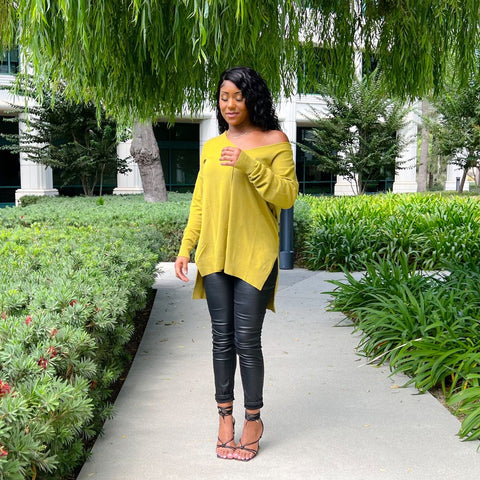 Olive mustard knit sweater with black leather pants 