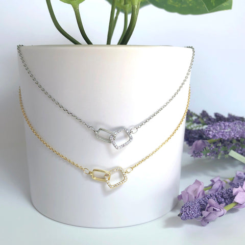 Infinity necklace in gold and .925 sterling silver