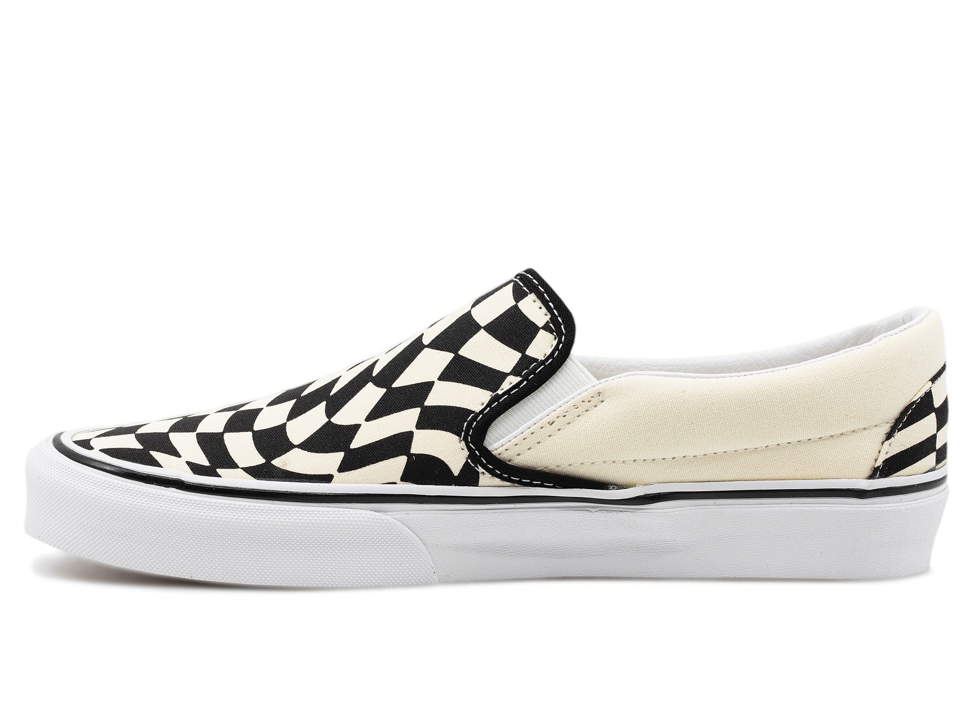 warped checkered vans