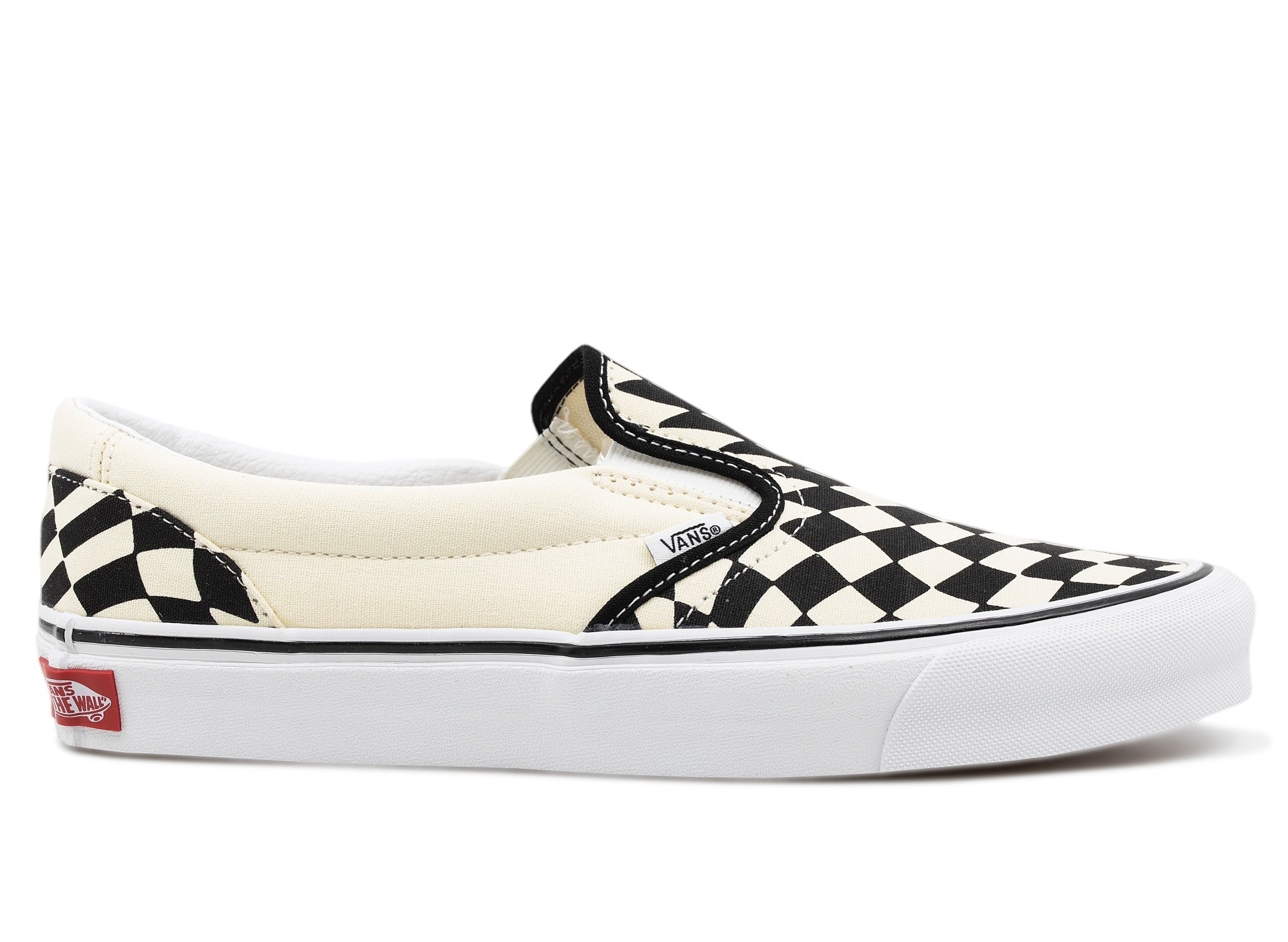 warped checkered vans