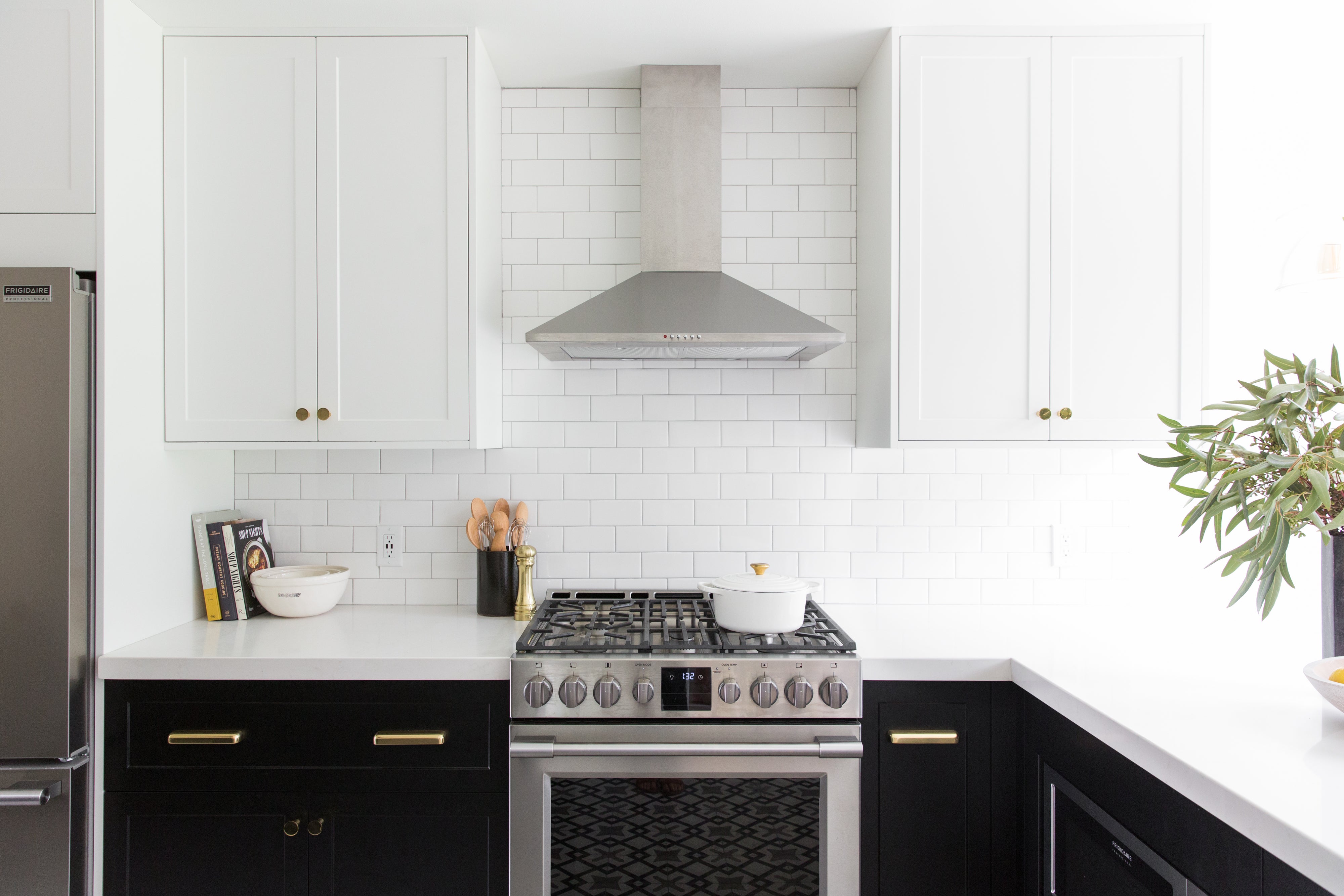 two-tone white uppers and black lower cabinets