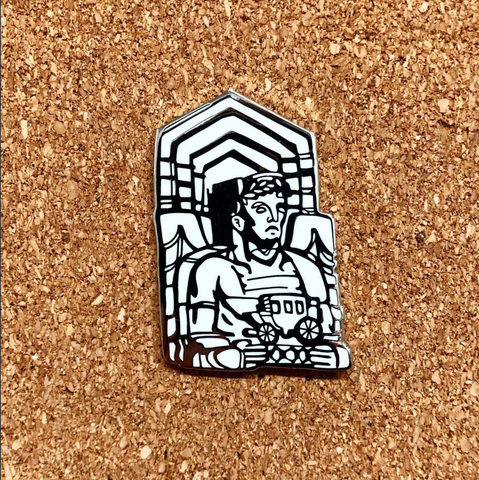 an enamel pin of one of Cleveland's Guardians of Traffic