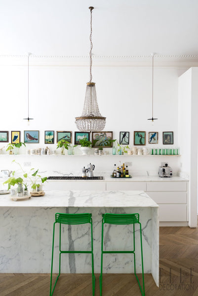Bright and Airy Kitchen with POPs of Greenery Throughout