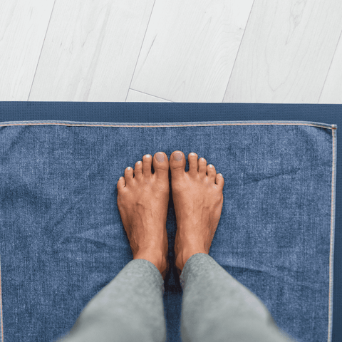 feet on a yoga mat