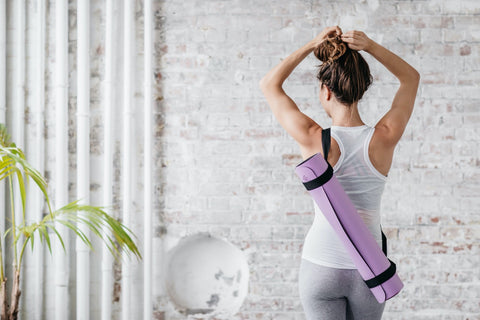 yoga mat in a carrying strap