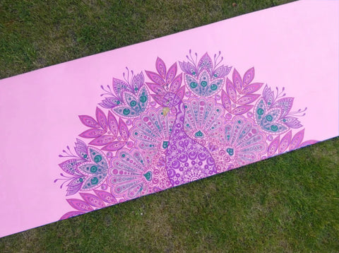 peacock drawing on purple yoga mat