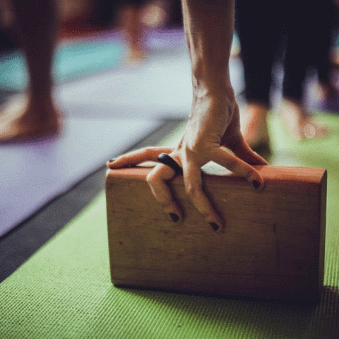 using a yoga block for stability