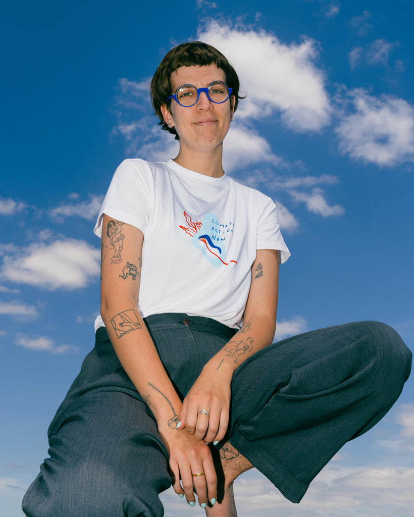 Abbey Rich wears Climate Action Now Tee