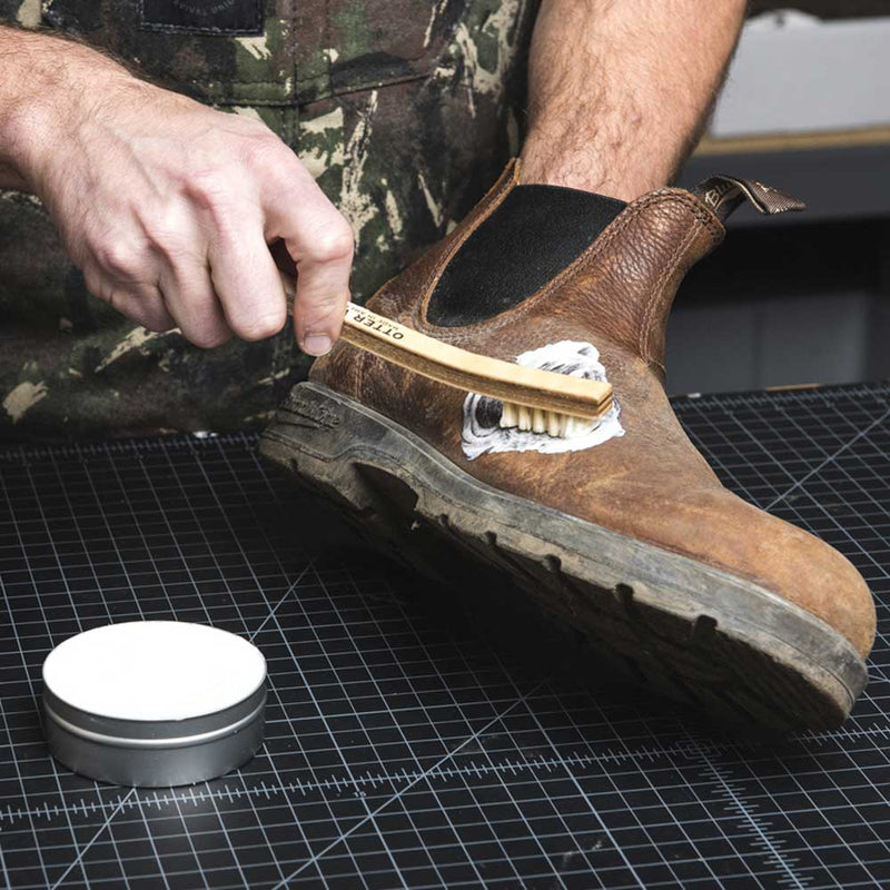 cleaning shoes with saddle soap