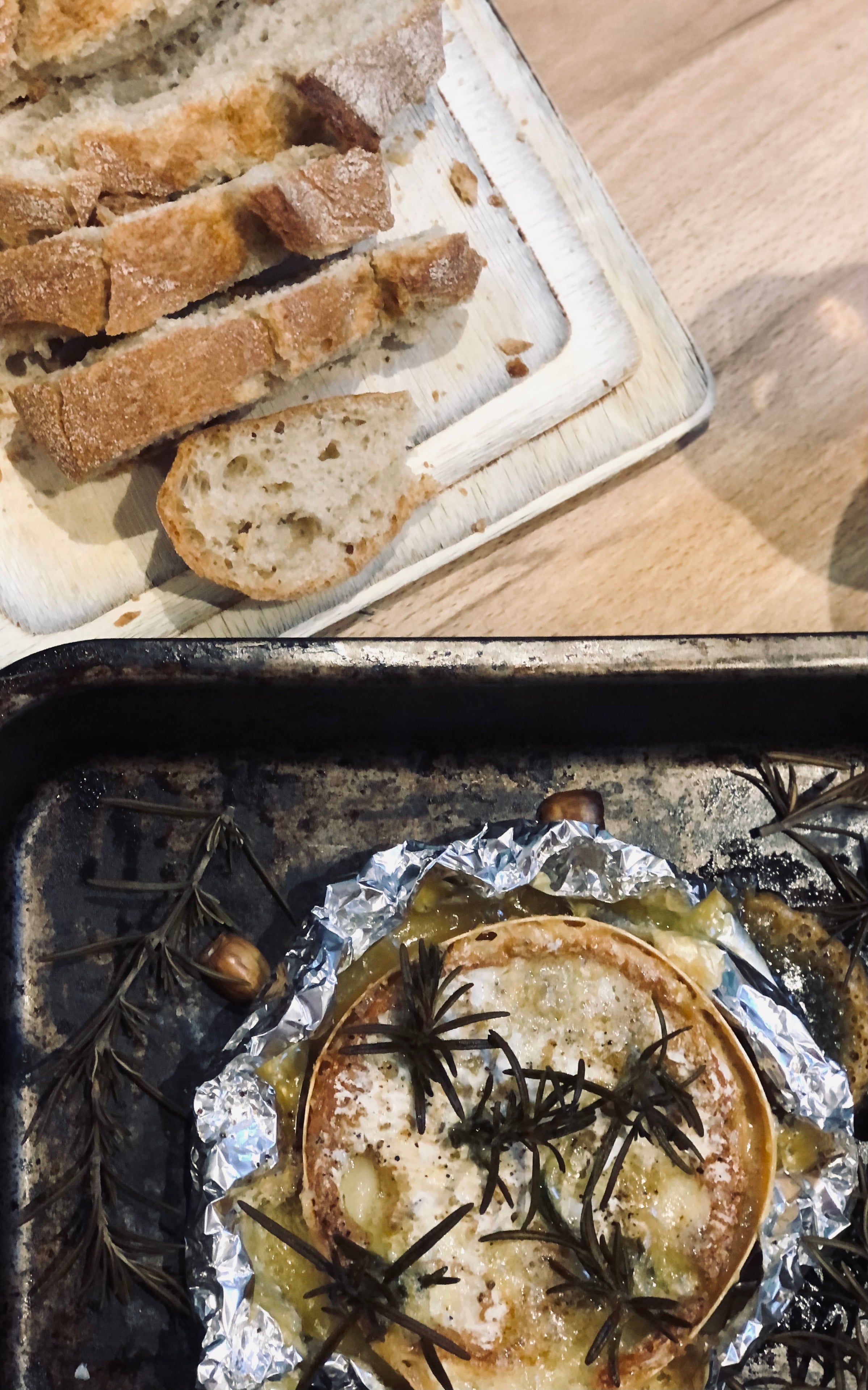 baked tunworth with garlic and rosemary served with toasted ciabatta from bakeri baltzersen