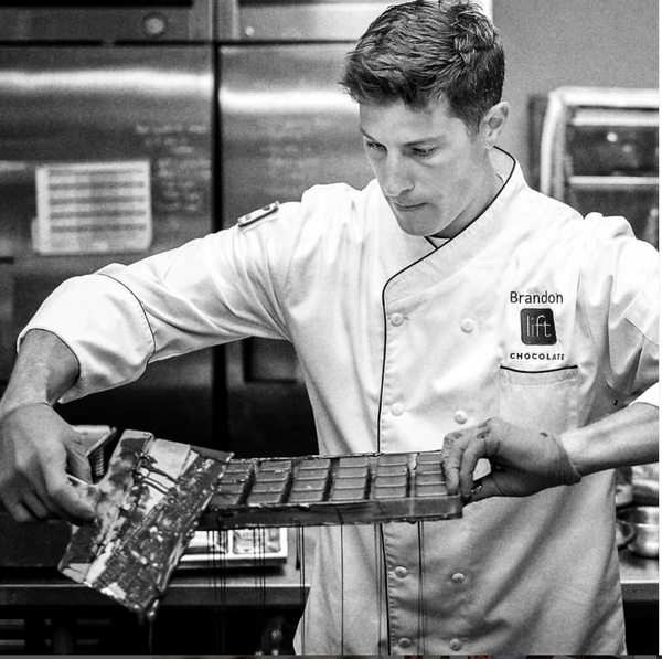 Brandon Busch making chocolates at LIFT Chocolate in Boulder