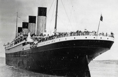 Black and white image of Titanic leaving port as she was in 1912