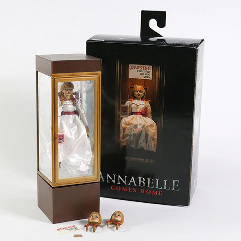 A boxed figurine version of the Annabelle doll from The Conjuring