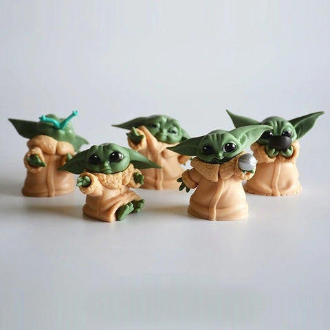 Five figurines of Grogu from The Mandalorian