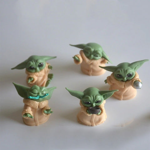 Five figurines of Grogu from The Mandalorian