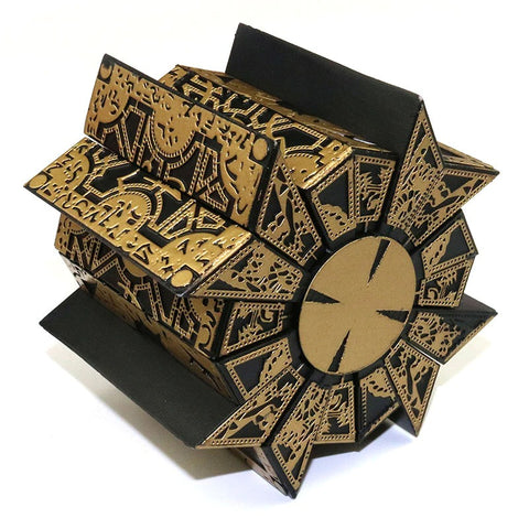 A figurine of the puzzle box from Hellraiser which has opened up