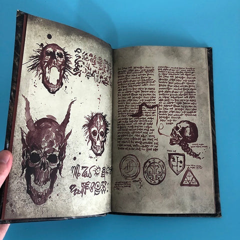 A replica of the Necronomicon aka Book of the Dead from Evil Dead opened up to show the inside of the book