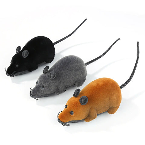 Three toy cat mice which are colored black, grey and ginger