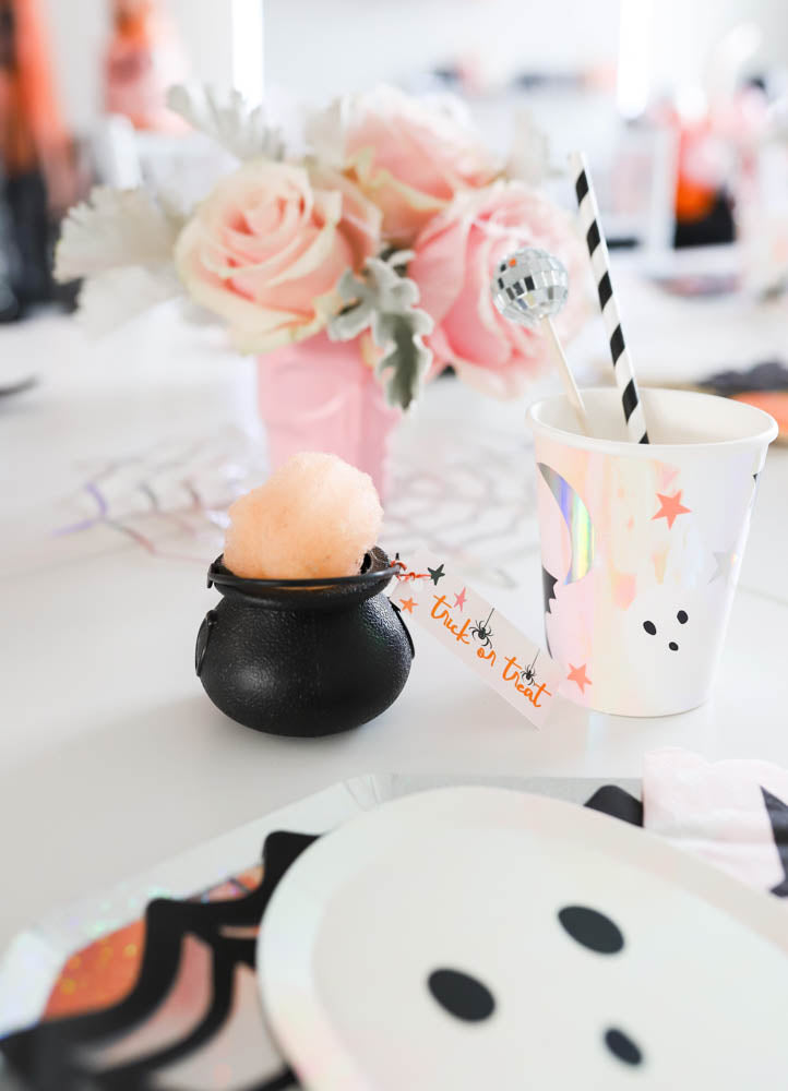 Cotton candy cauldrons by Sugarcube YYC. Disco ball stir sticks by Dixie + Twine. 