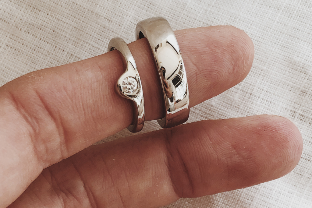 RUUSK solid white gold wedding bands for him and her.
