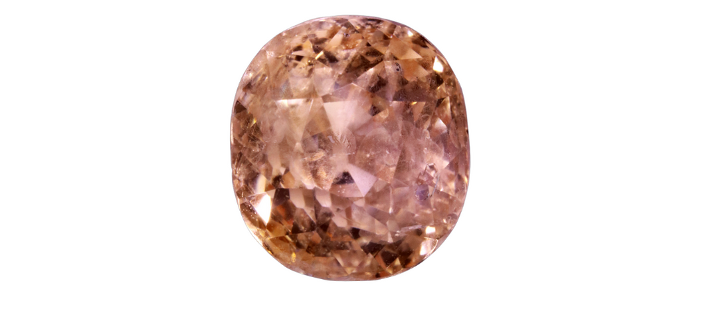 The "Padparadscha" sapphire documented by the American Museum of Natural History.