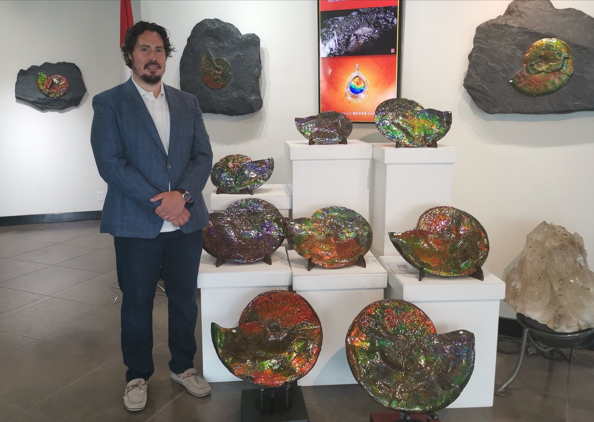 Peter Lovisek posing with Ammonite Fossils