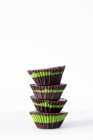 four stacked matcha cups chocolate and green