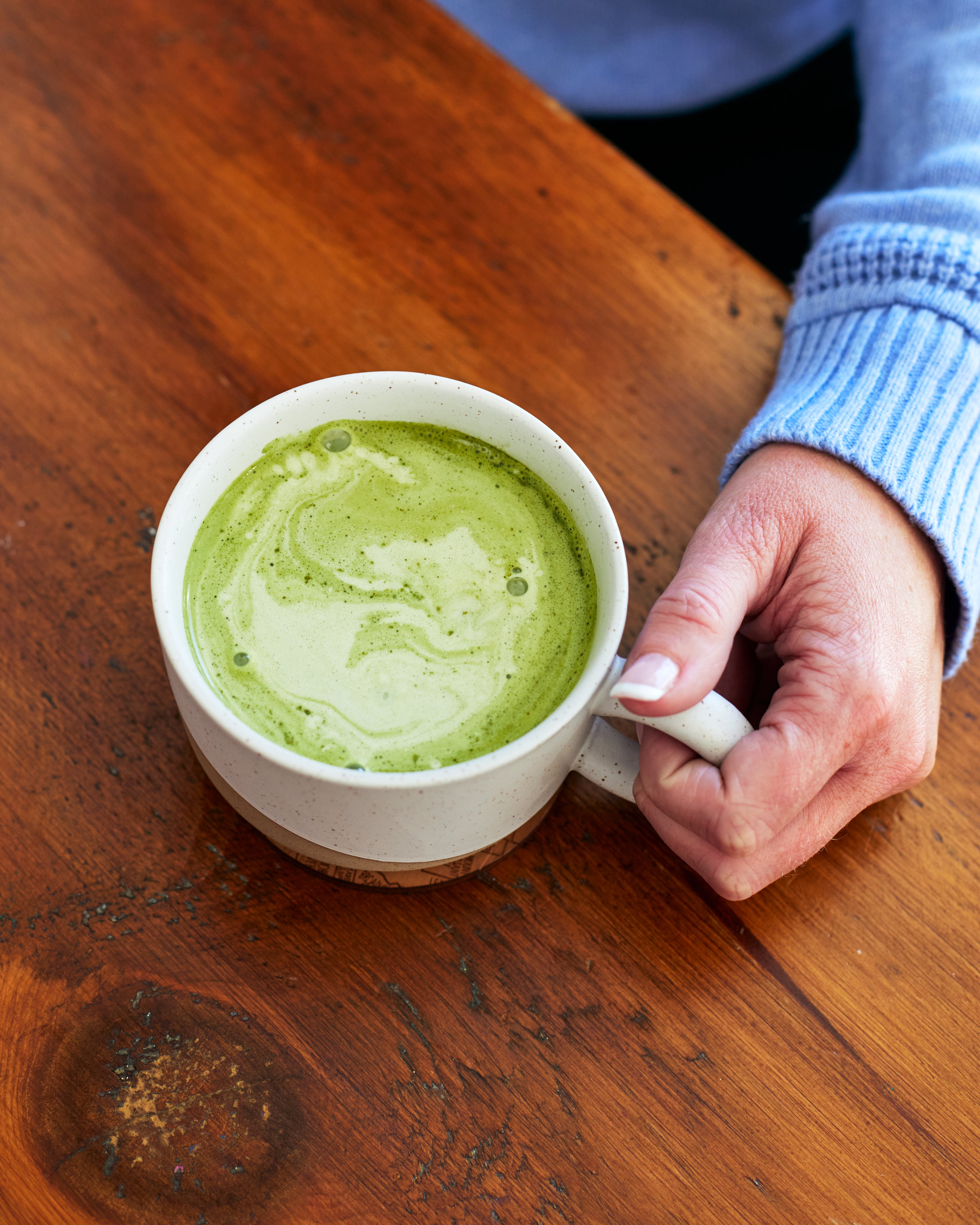 Cup of JOYÀ's Focus Matcha Superblend latter