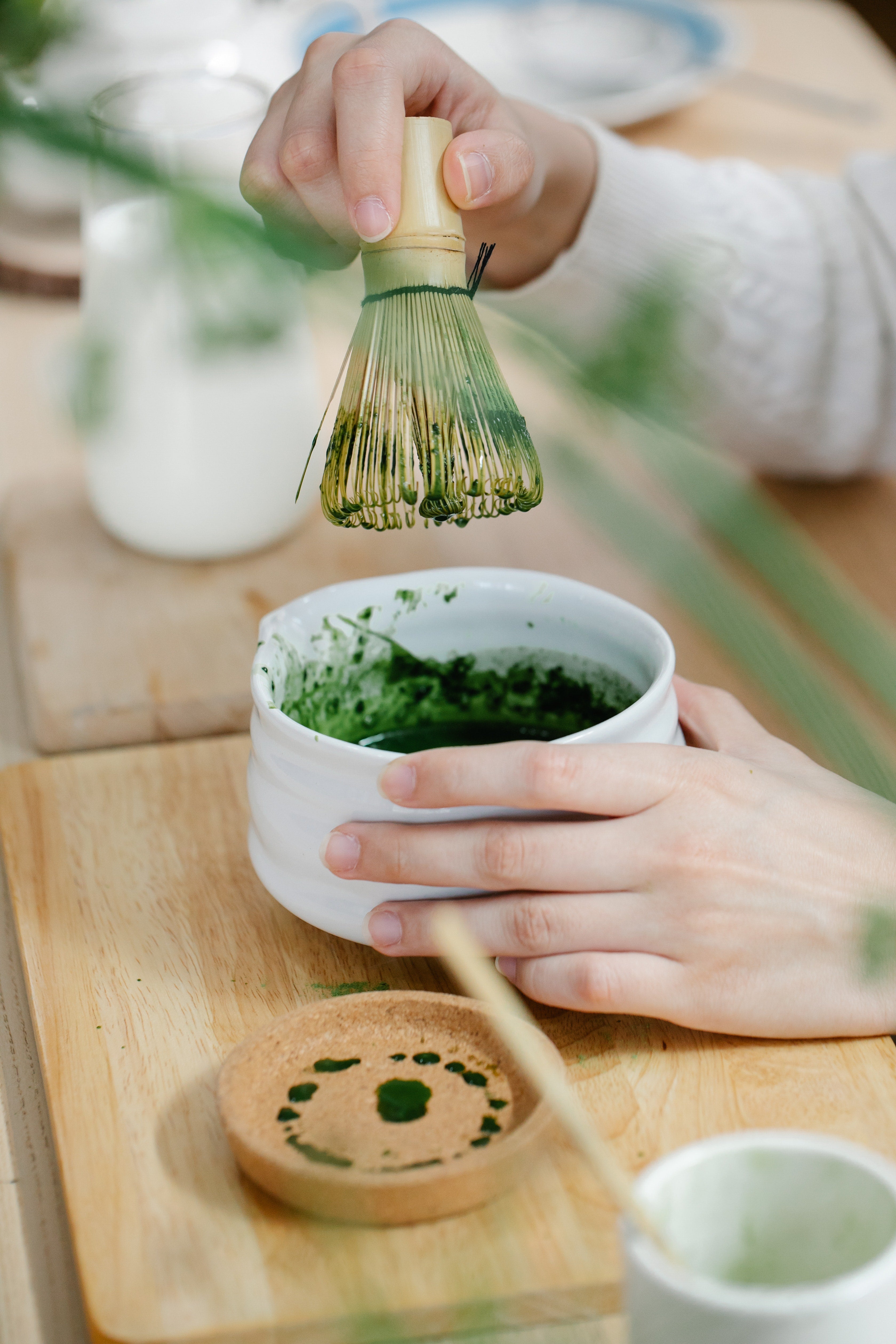 Whisking Matcha with a chasen