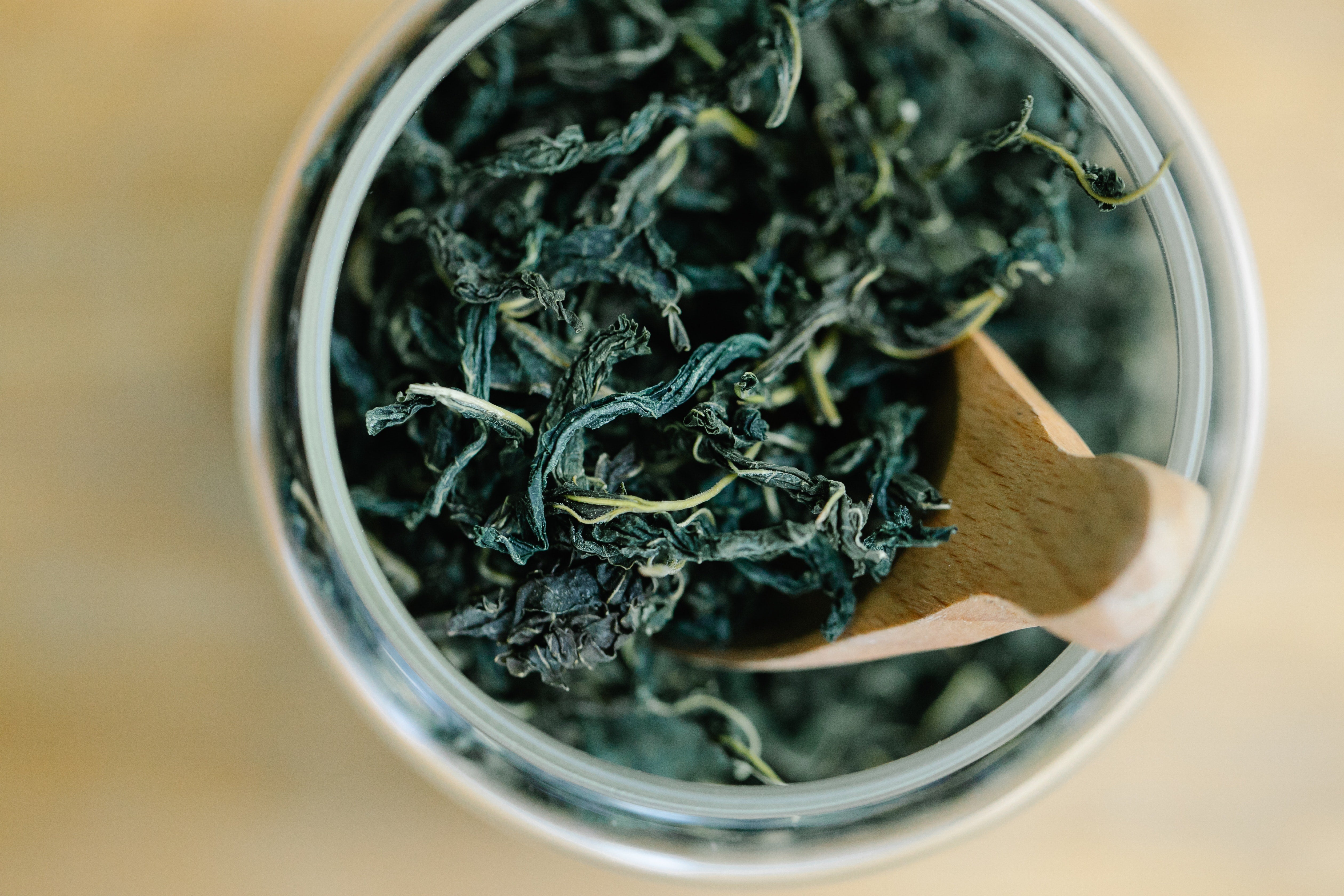 Overhead image of loose tea leaves