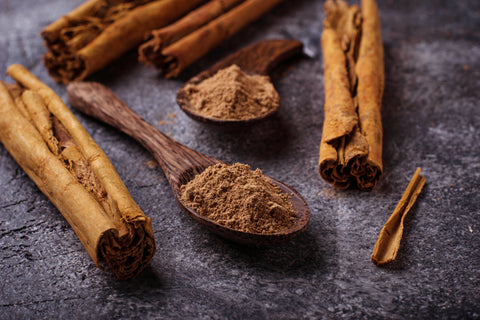 Image of both cinnamon sticks and ground powder