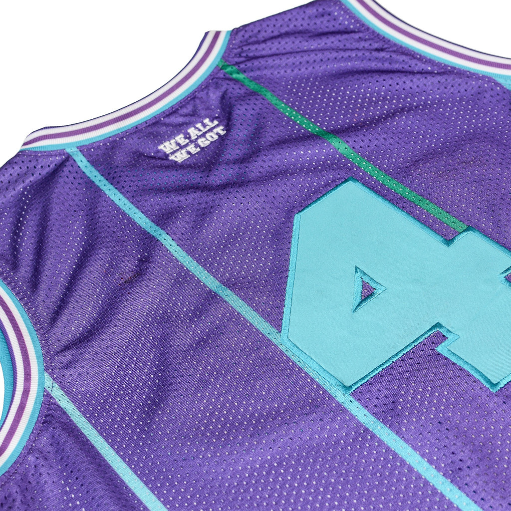 purple and turquoise jersey