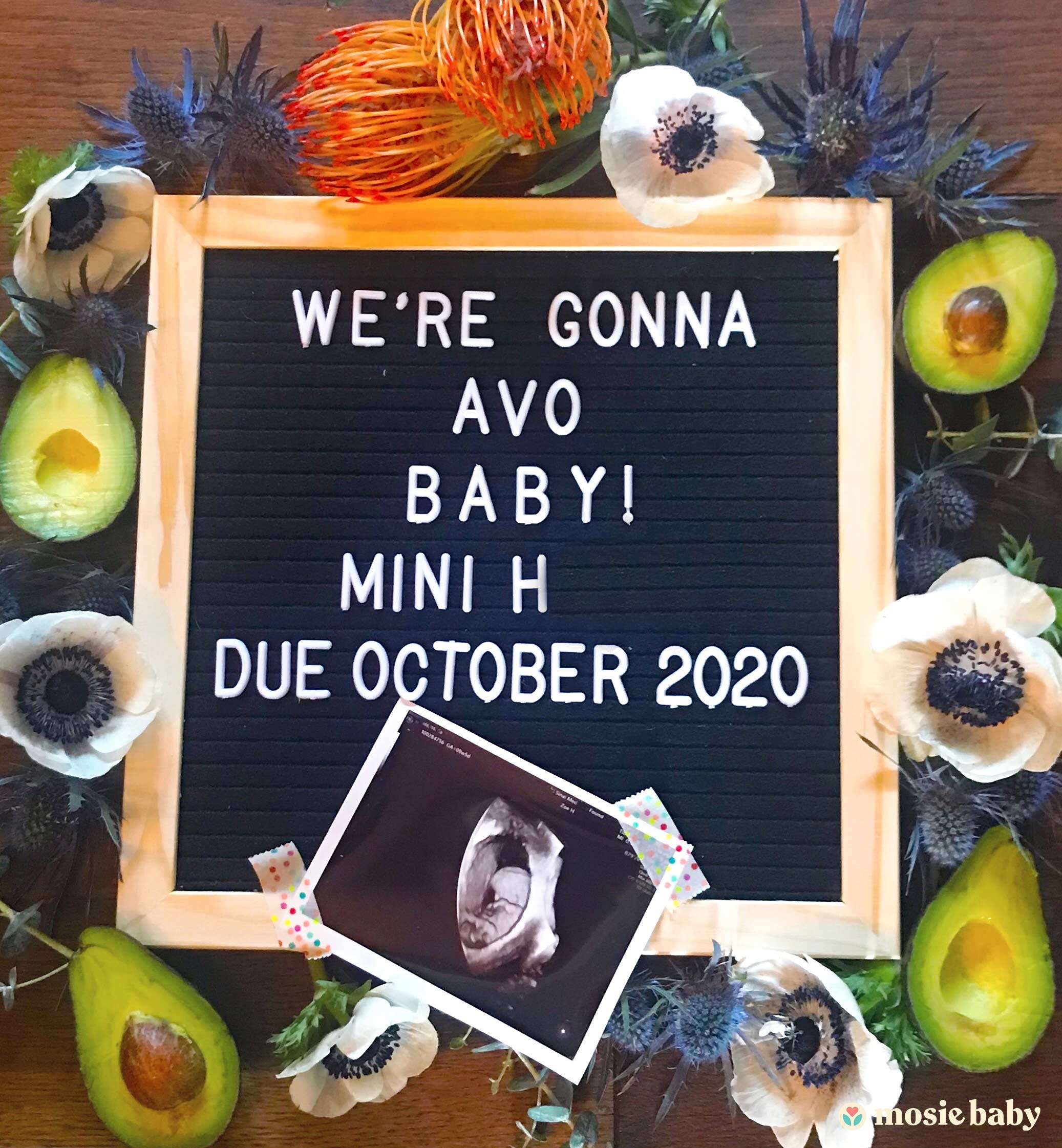 Mosie Baby pregnancy announcement with avocados