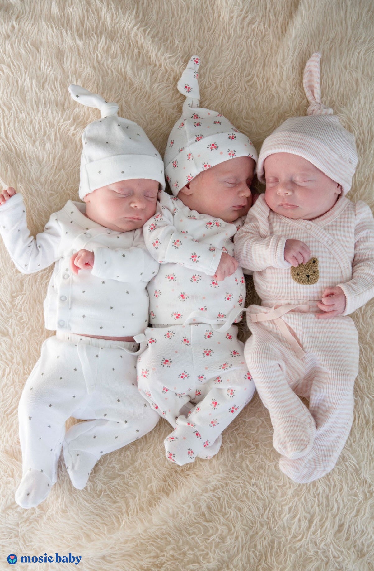 newborn triplets sleeping