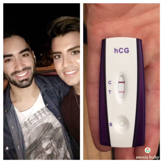 gay couple with a positive pregnancy test