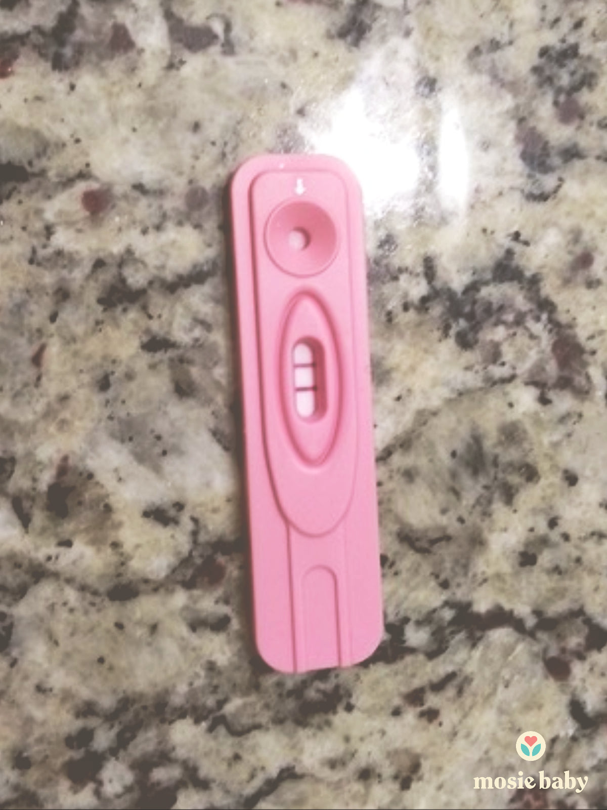 positive pregnancy test of a Mosie User