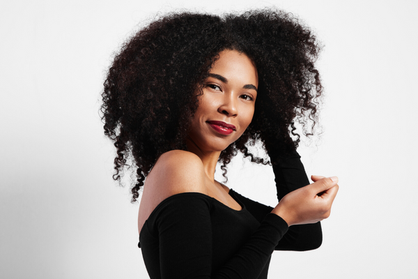 woman with long curly hair