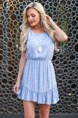 blue dress and long necklace