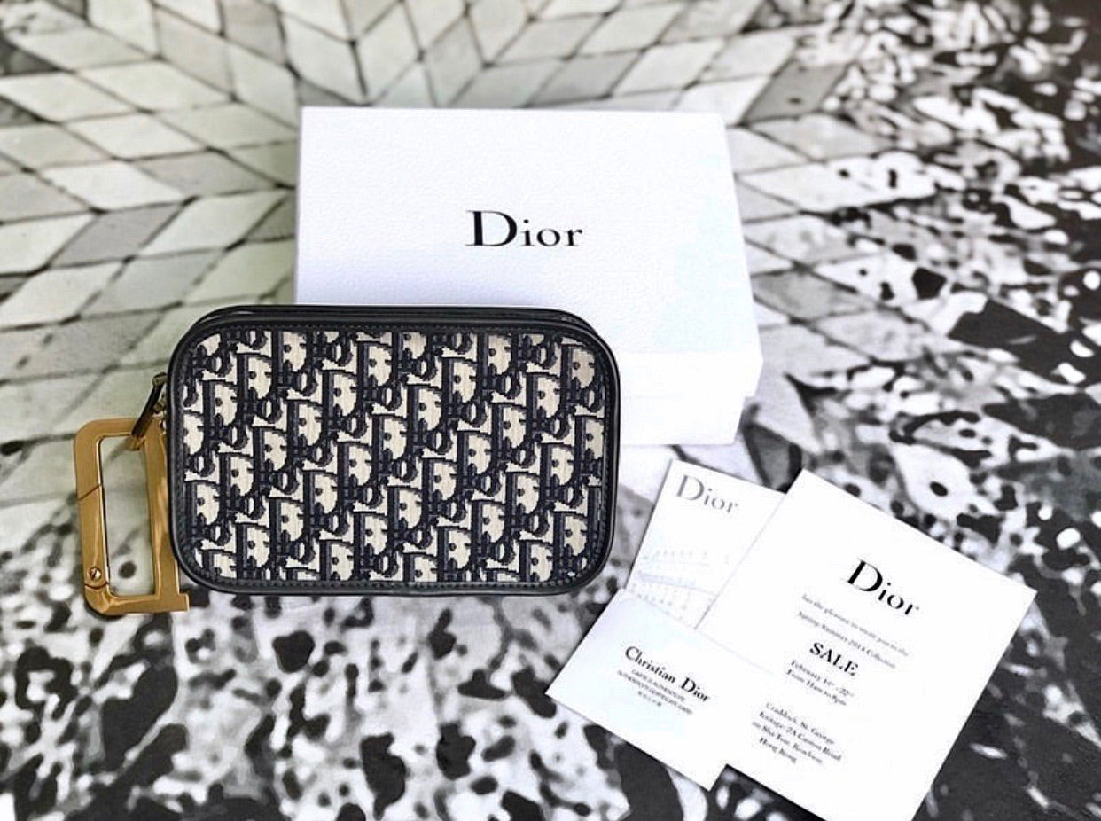 dior saddle oblique clutch