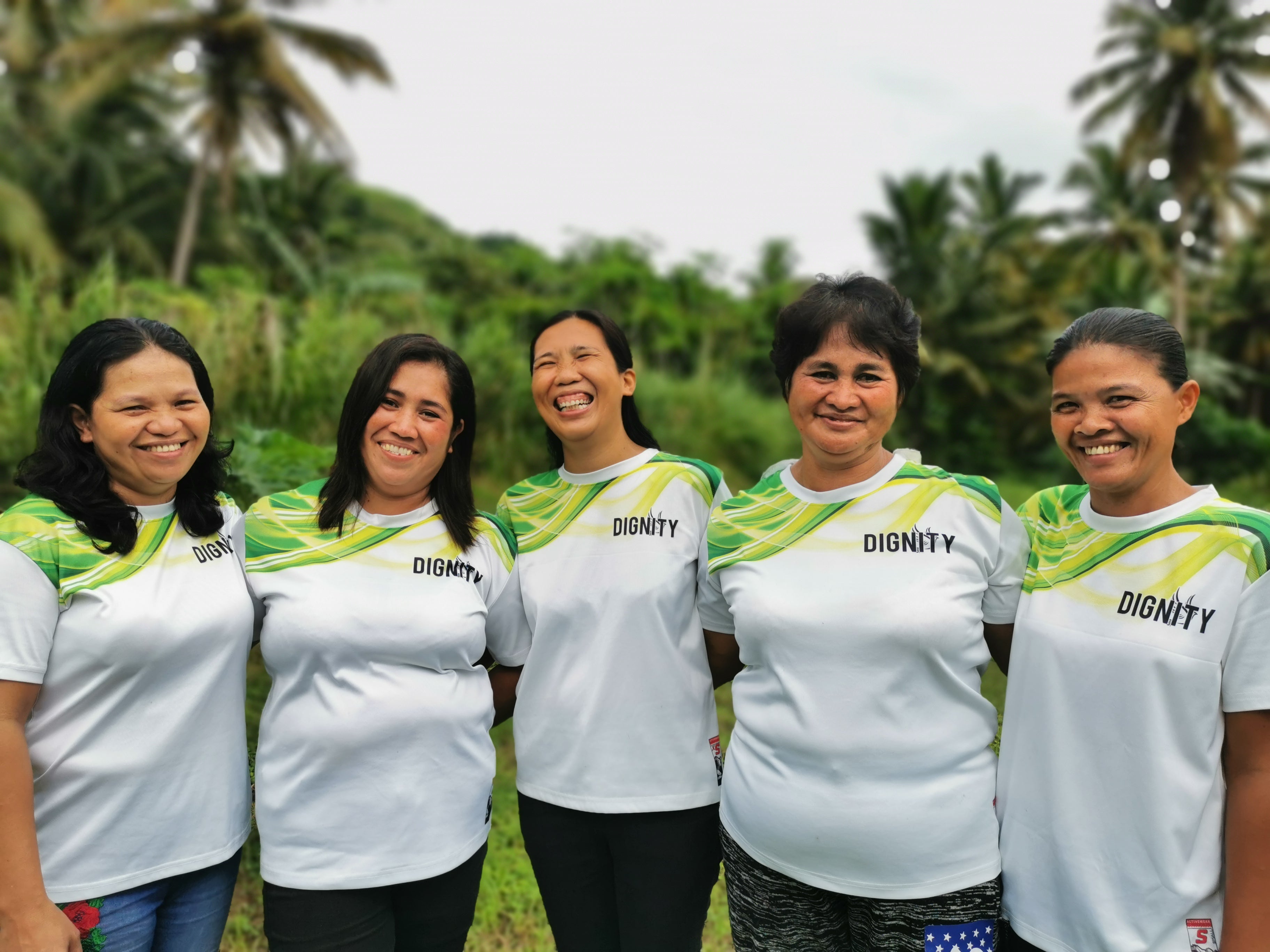 Group of Filipino women together laughing