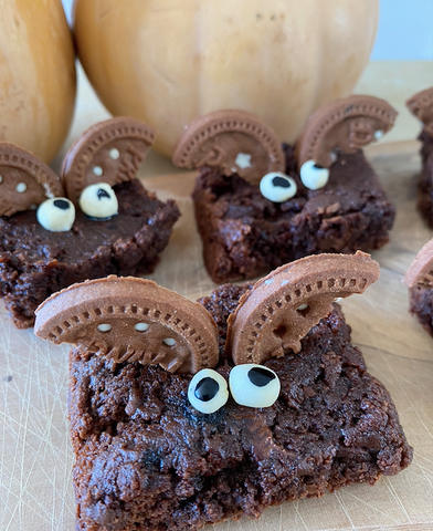 brownies that look like little bats with cookies for the wings and edible googly eyes