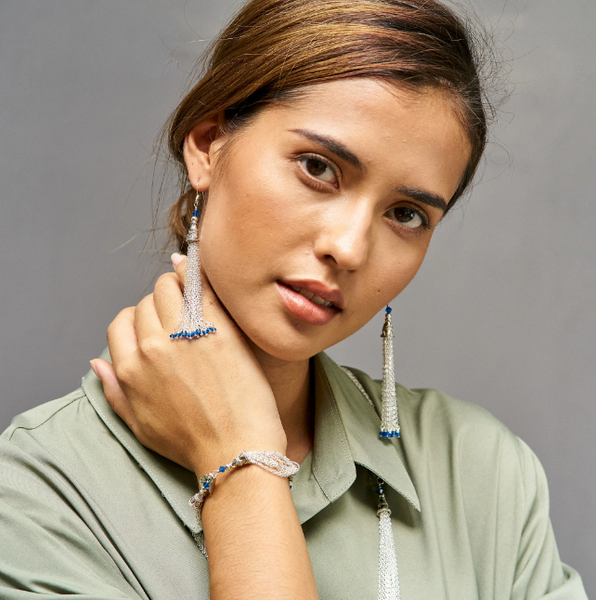 Girl showing off jewelry