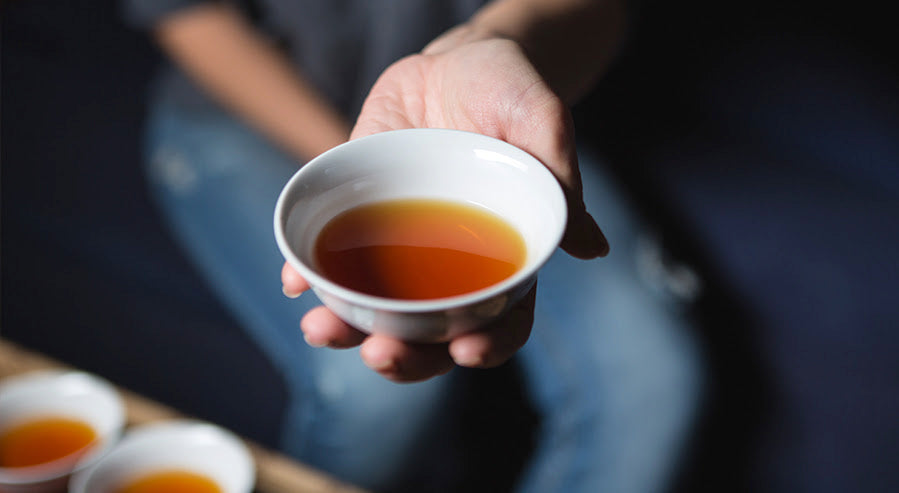 A Person Drinking Lapsang Souchong Tea