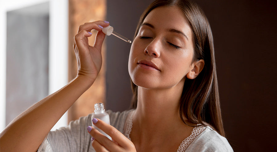 A Woman Applying a Skincare Product